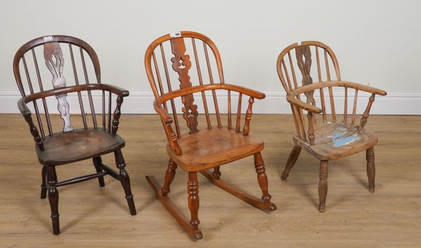 A CHILD’S YEW AND ELM WINDSOR ROCKING CHAIR (3)