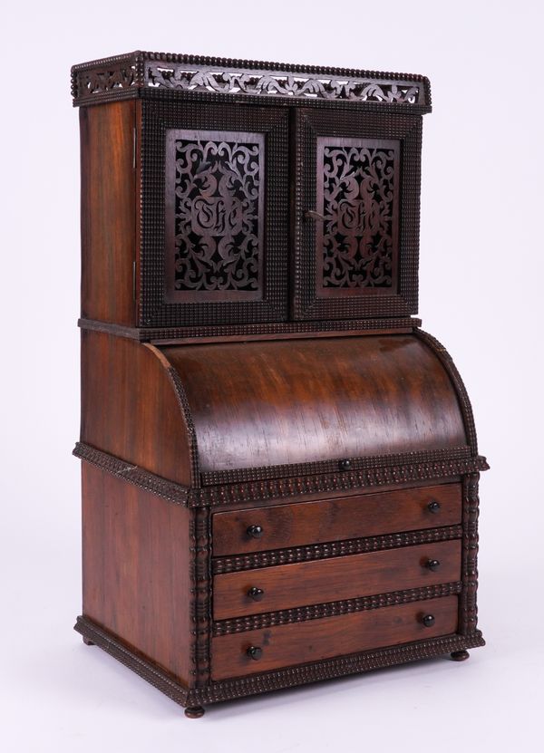 A LATE 19TH / EARLY 20TH CENTURY CONTINENTAL ROSEWOOD MINIATURE CYLINDER BUREAU CABINET WITH FRET CUT DOORS