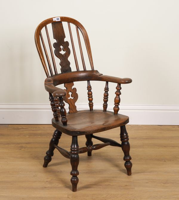 A 19TH CENTURY ASH AND ELM CHILD’S WINDSOR CHAIR WITH PIERCED SPLAT BACK