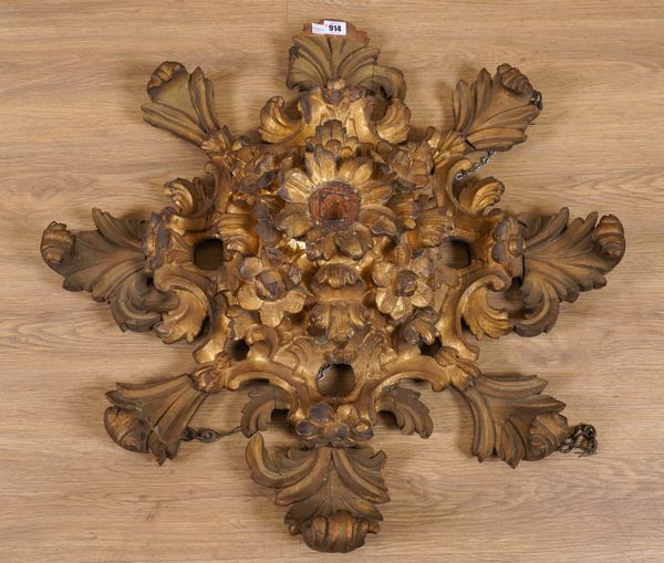 A 19TH CENTURY CARVED AND GILDED CEILING BOSS