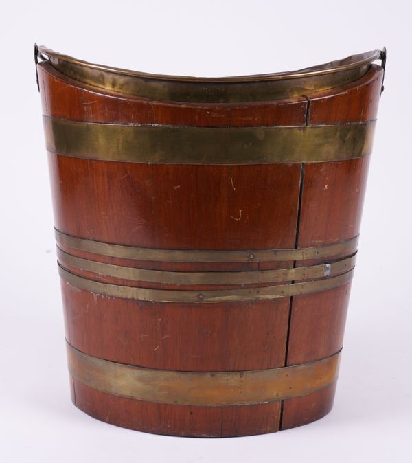 A GEORGE III STYLE COOPERED BRASS BOUND BUCKET OF NAVETTE FORM