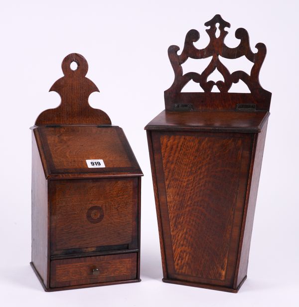 A GEORGE III INLAID OAK SLOPE FRONT SALT/CANDLE BOX WITH SINGLE DRAWER BASE (2)