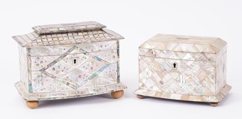 A REGENCY MOTHER-OF-PEARL VENEERED TWIN DIVISION TEA CADDY ON BUN FEET (2)