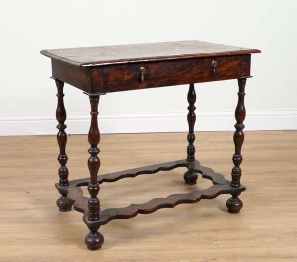 A WILLIAM AND MARY SOLID YEW SINGLE DRAWER SIDE TABLE ON TURNED SUPPORTS UNITED BY SHAPED PERIMETER STRETCHER