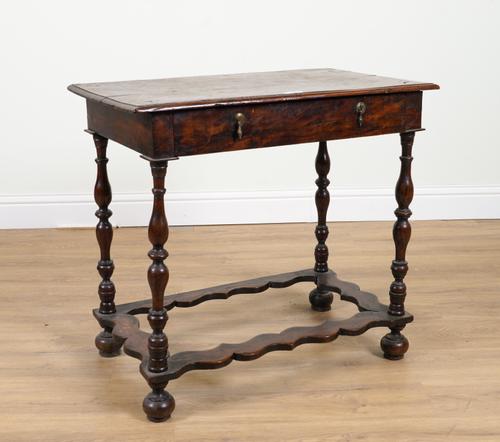 A WILLIAM AND MARY SOLID YEW SINGLE DRAWER SIDE TABLE ON TURNED SUPPORTS UNITED BY SHAPED PERIMETER STRETCHER