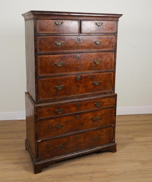 A GEORGE I FEATHER BANDED WALNUT CHEST ON CHEST WITH TWO SHORT OVER SIX LONG GRADUATED DRAWERS