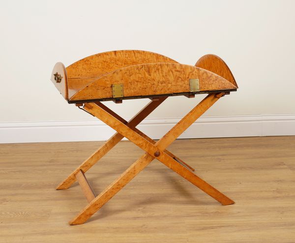 A 19TH CENTURY BRASS MOUNTED BIRD'S EYE MAPLE DROP FLAP BUTLER'S TRAY ON FOLDING X-FRAME STAND