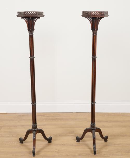 A PAIR OF 19TH CENTURY ROSEWOOD TORCHERE OR JARDINIERE STANDS ON TRIPLE CLUSTER COLUMN TRIPOD BASES (2)