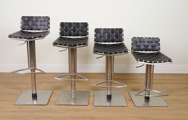 A SET OF FOUR 20TH CENTURY BLACK LEATHERETTE AND CHROME HEIGHT ADJUSTABLE BAR STOOLS