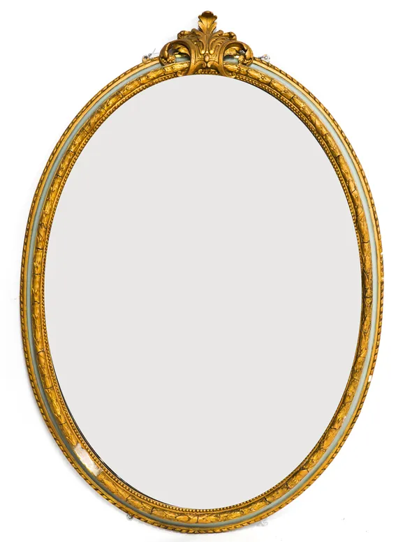 A LARGE 19TH CENTURY PARCEL GILT BLUE PAINTED OVAL MIRROR WITH ACANTHUS SCROLL CREST