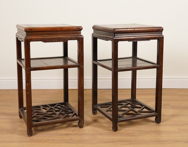 A NEAR PAIR OF LATE 19TH CENTURY CHINESE SQUARE HARDWOOD TWO TIER OCCASIONAL TABLES WITH COCK-PEN PLATFORM UNDER-TIERS (2)