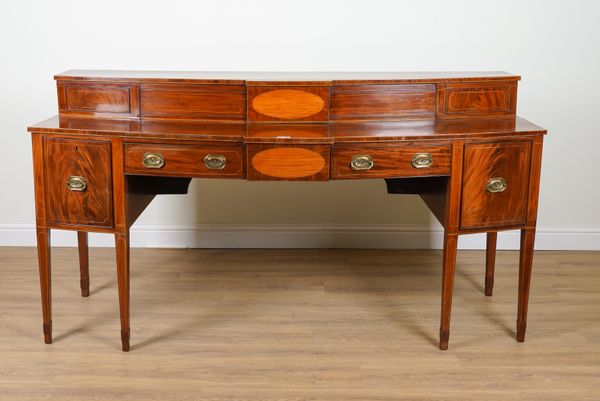 A LARGE GEORGE III INLAID MAHOGANY BOWFRONT SIDEBOARD