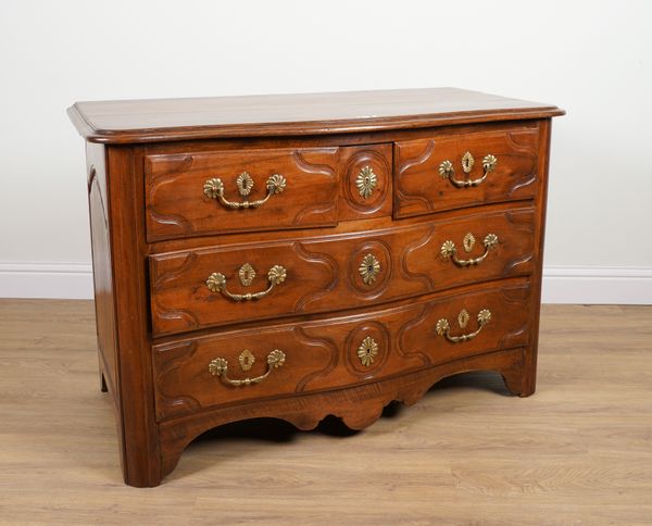 AN 18TH CENTURY PROVINCIAL FRENCH WALNUT SERPENTINE THREE DRAWER COMMODE