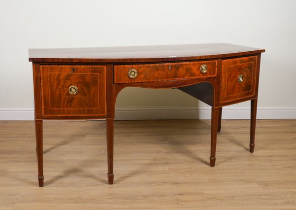 A GEORGE III INLAID MAHOGANY BOWFRONT THREE DRAWER SIDEBOARD