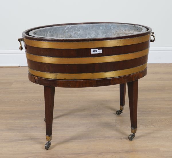 AN 18TH CENTURY OVAL COOPERED MAHOGANY WINE COOLER ON STAND