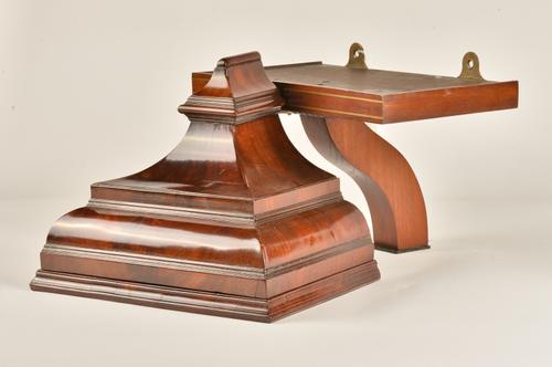 TWO MAHOGANY CLOCK BRACKETS