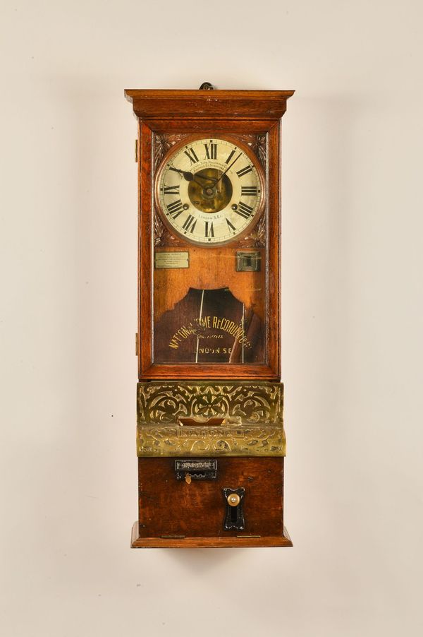 AN OAK CASED NATIONAL CARD TIME RECORDER
