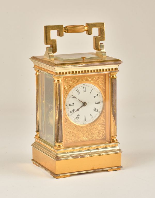 A FRENCH GILT BRASS STRIKING AND REPEATING CARRIAGE CLOCK