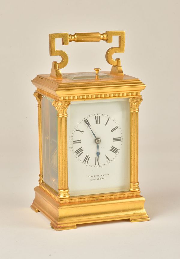 A FRENCH GILT-BRASS STRIKING AND REPEATING CARRIAGE CLOCK AND TRAVELLING CASE