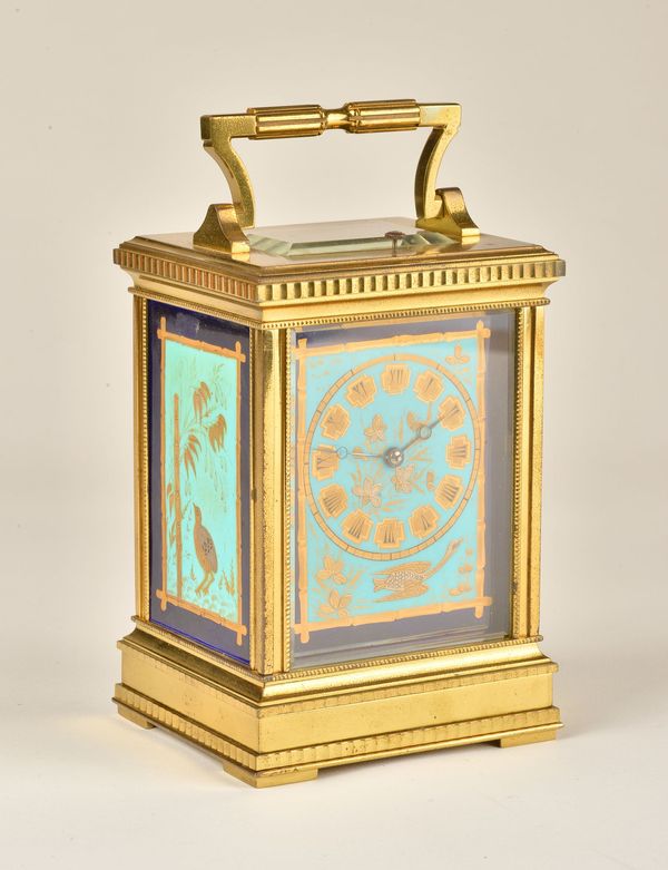 A FRENCH BRASS AND FOUR PANEL ‘JAPONISME’ DECORATED PORCELAIN STRIKING AND REPEATING CARRIAGE CLOCK