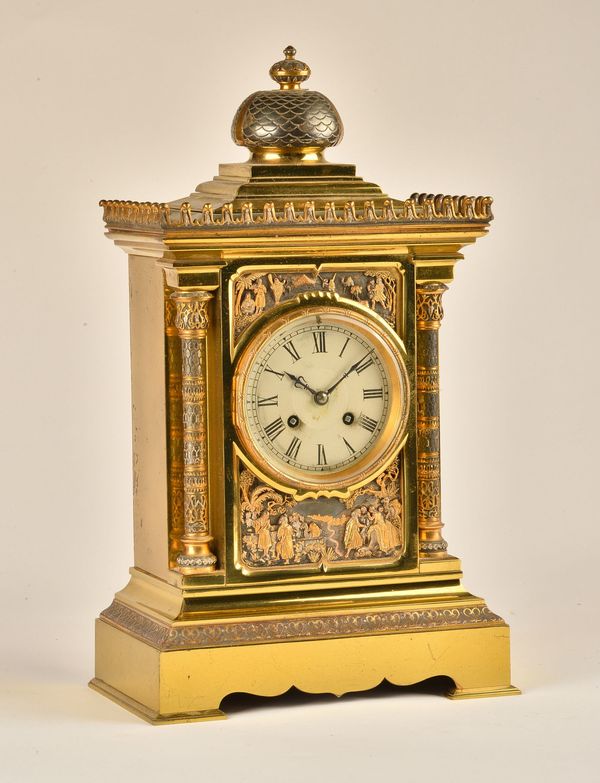 A FRENCH GILT, SILVERED AND PATINATED BRASS MANTEL CLOCK