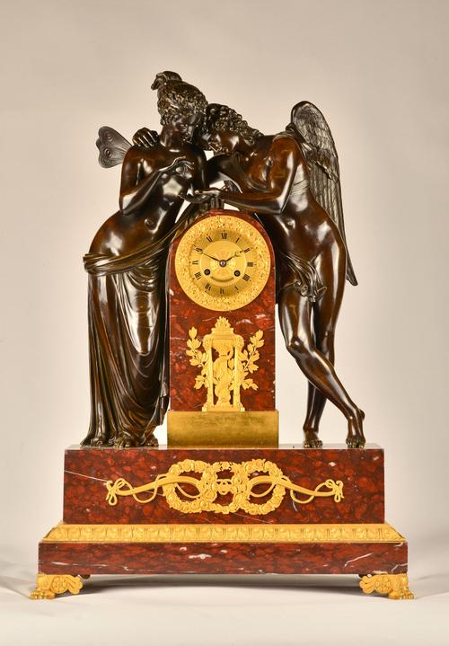 A RESTAURATION ORMOLU, BRONZE AND GRIOTTE MARBLE MANTEL CLOCK