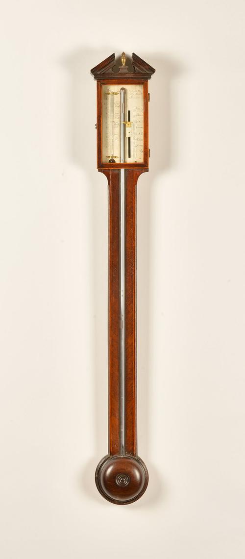 A GEORGE III MAHOGANY STICK BAROMETER