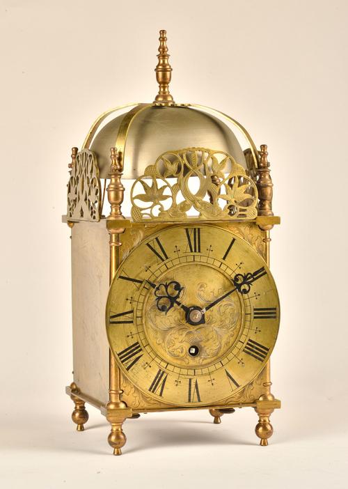 A BRASS LANTERN TIMEPIECE