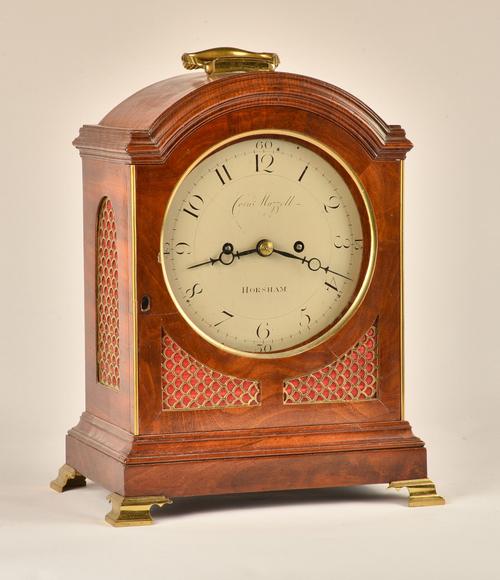 A GEORGE III MAHOGANY STRIKING BRACKET CLOCK