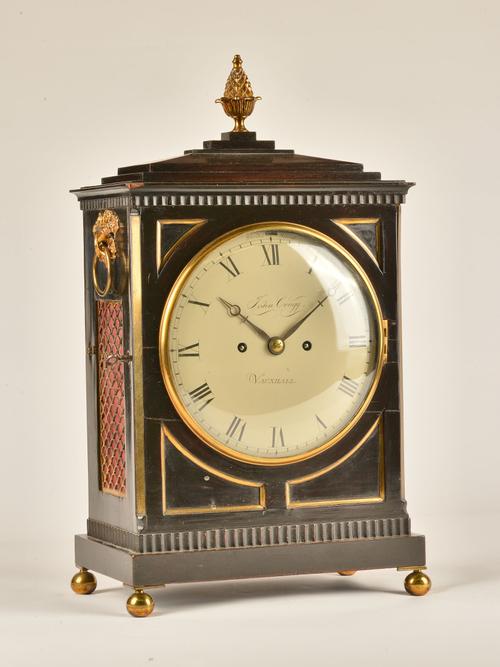 A RARE REGENCY BRASS-MOUNTED EBONISED QUARTER STRIKING BRACKET CLOCK