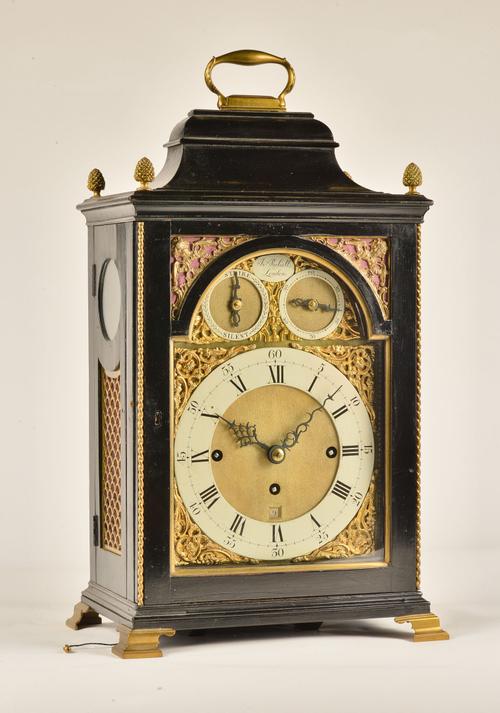 A GEORGE III GILT-METAL-MOUNTED EBONISED QUARTER STRIKING BRACKET CLOCK