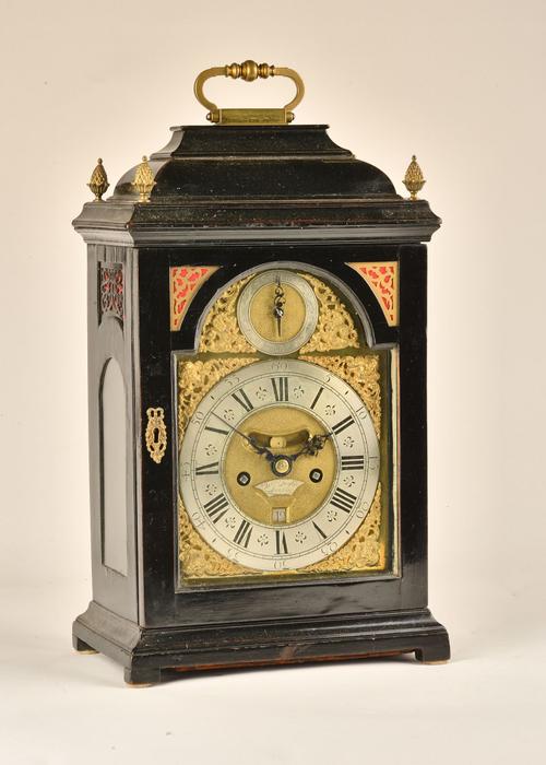 A GEORGE II BRASS-MOUNTED EBONISED QUARTER REPEATING AND STRIKING BRACKET CLOCK