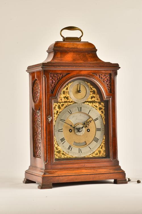A GEORGE III MAHOGANY STRIKING AND REPEATING BRACKET CLOCK WITH ALARM