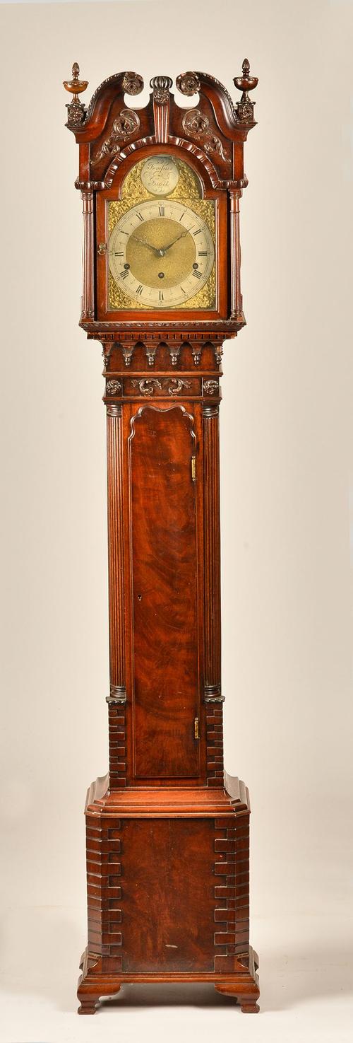 AN EDWARDIAN MAHOGANY QUARTER CHIMING MINIATURE LONGCASE CLOCK