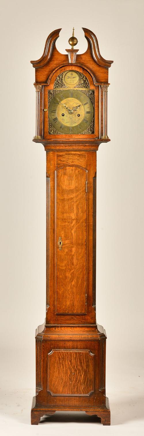 AN EDWARDIAN OAK LONGCASE ‘GRANDMOTHER’ CLOCK