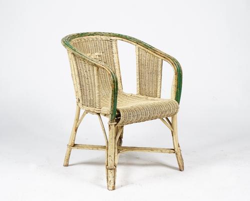 A cream and green-painted caned armchair (2)