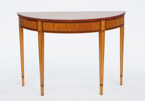 An Edwardian mahogany banded satinwood semi-elliptical console