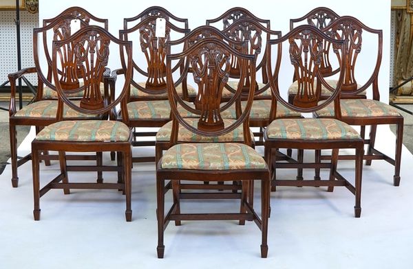 A set of twelve Hepplewhite design mahogany shield back dining chairs