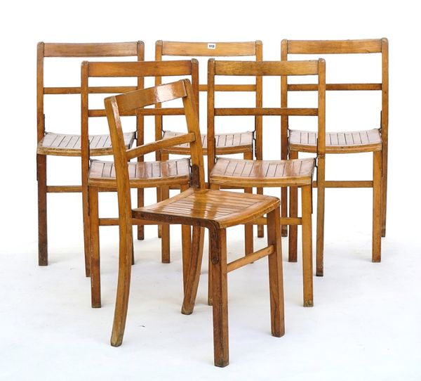 A set of six metal bound beech stacking chairs