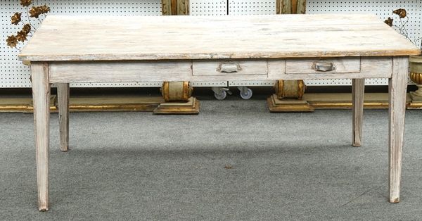 A French Provincial pine painted kitchen table