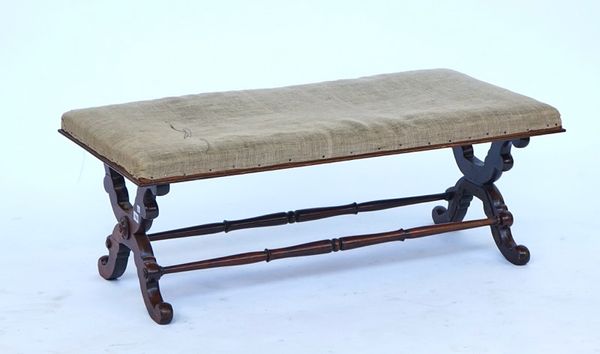 A Victorian rosewood long footstool