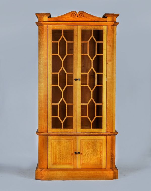 LINLEY; a pair of oak astragal glazed bookcase cabinets