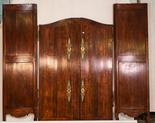 A LATE 18TH CENTURY FRENCH CHESTNUT ARCH TOP TWO DOOR ARMOIRE