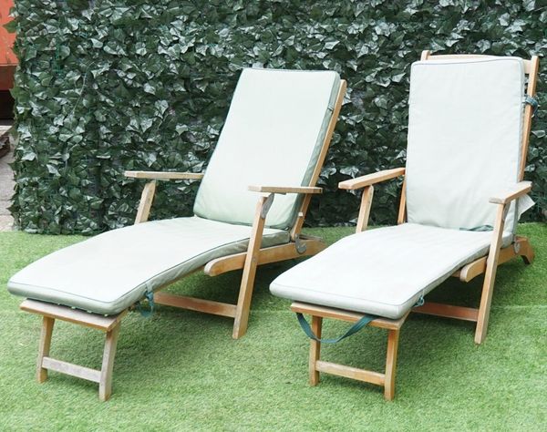 A pair of modern slatted teak Steamer chairs