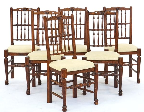 Multiyork; a set of six 17th century style oak bobbin back dining chairs