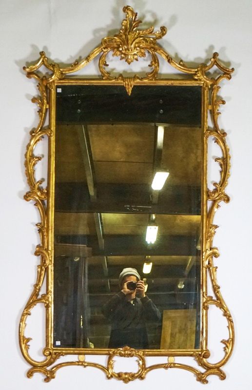 A pair of Chippendale style gilt framed mirrors