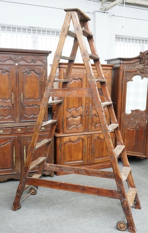 A large set of pitch pine A-frame library steps