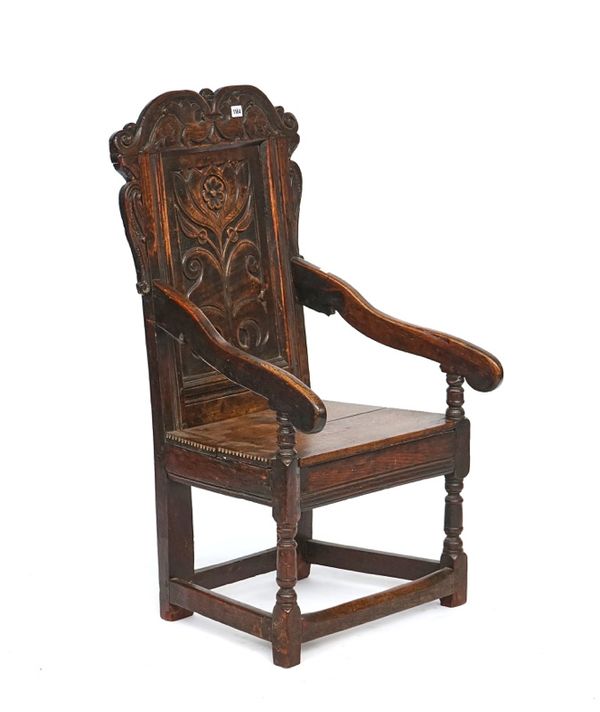 A Charles II oak Wainscot open armchair