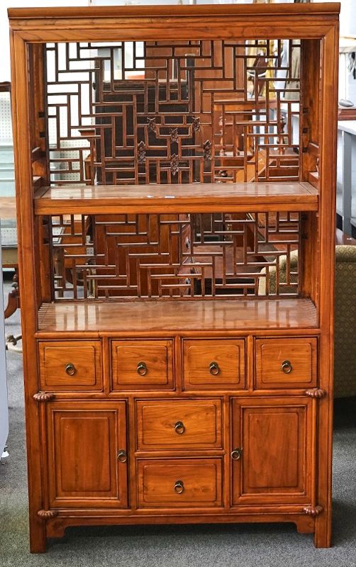 A Chinese elm side cabinet