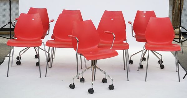 Vico Magistretti for Kartell Italy; a set of nine Maui red resin and tubular chrome chairs